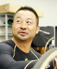 山崎芳仁の顔写真