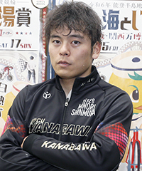 新村穣