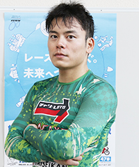 新村穣